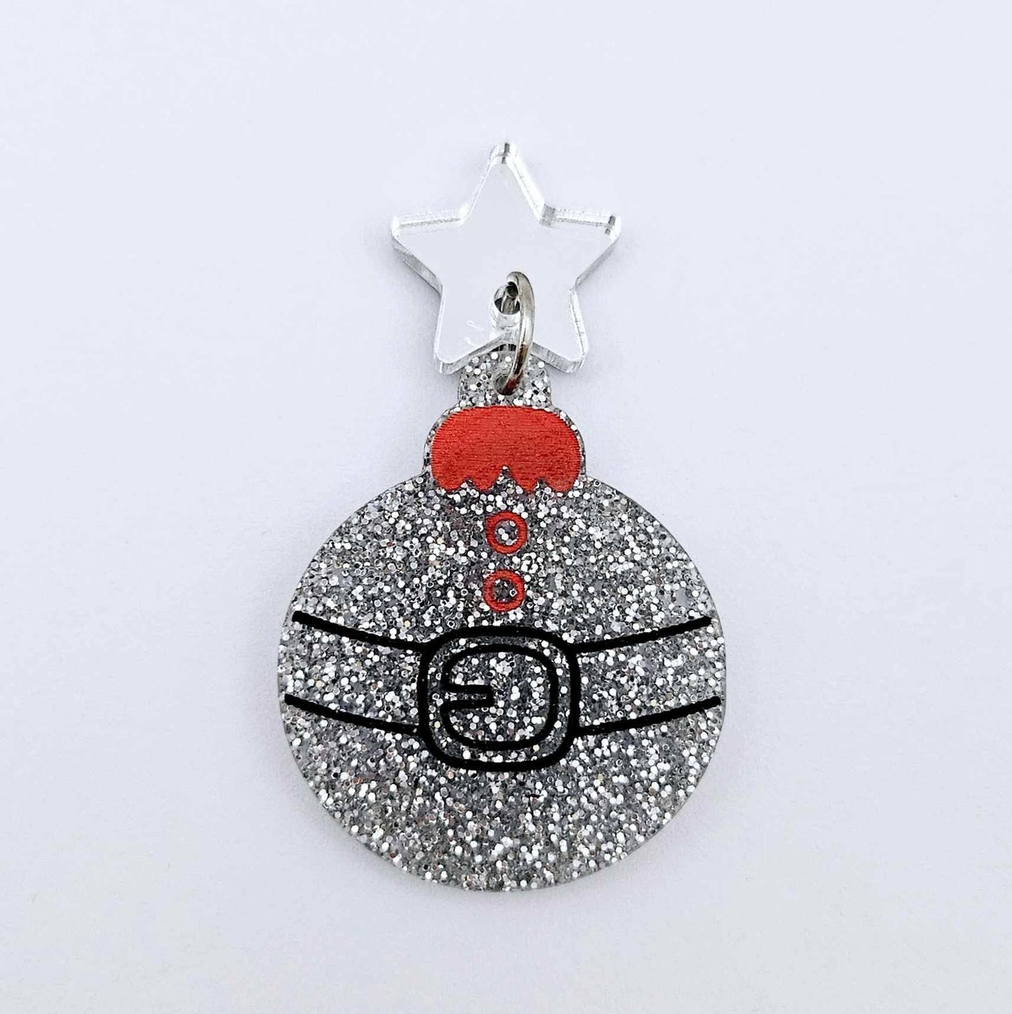 One silver glitter Santa bauble dangle with engraved Santa belt and button details paint filled red and black, assembled with a 16mm silver mirror star topper