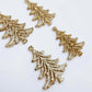 Two pairs of 35mm rose gold glitter Cascade Christmas Tree dangle earring blanks laying flat on a white background