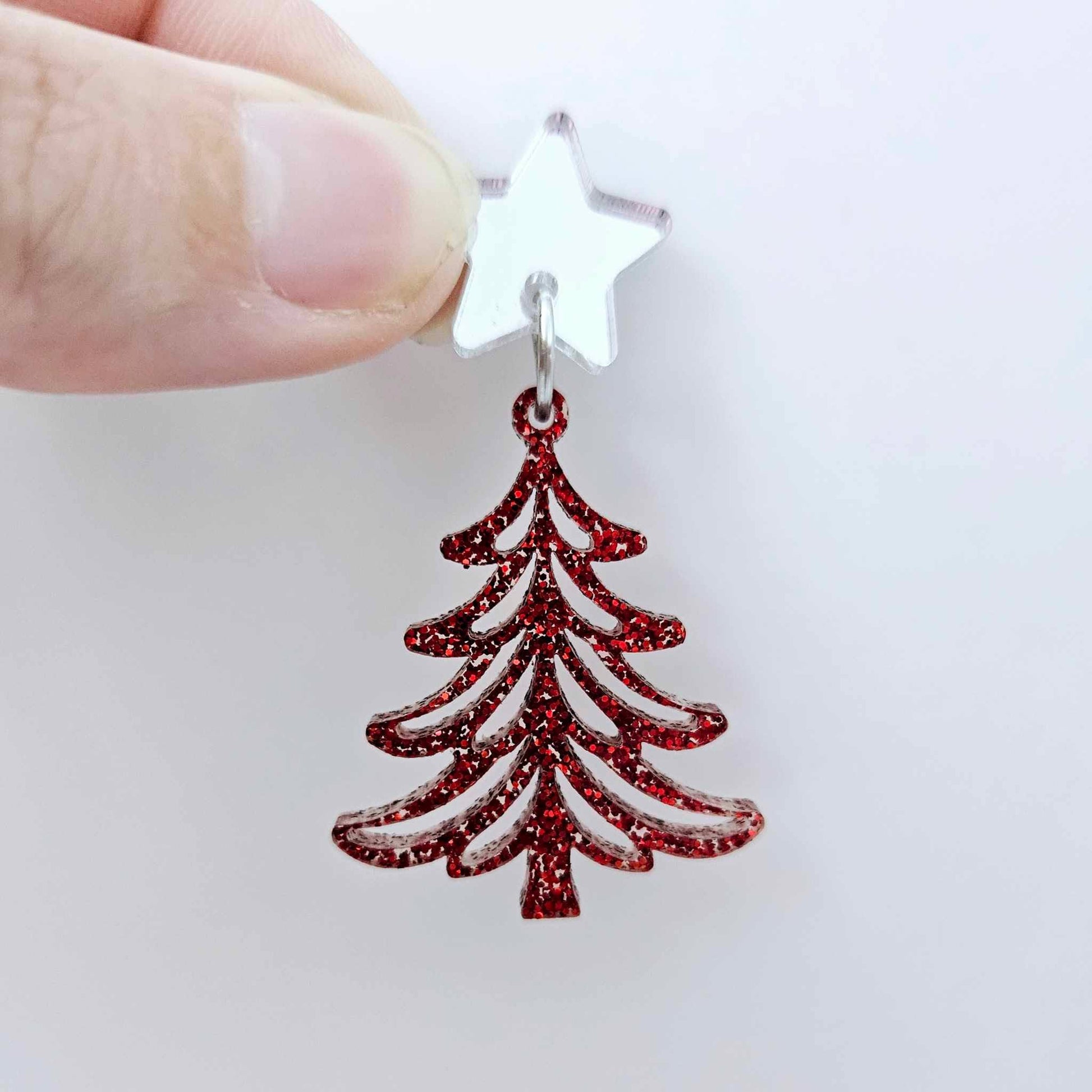 One 35mm red glitter Cascade Christmas Tree dangle blank assembled with a 16mm star topper, shown as a finished earring component