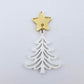 One 35mm white acrylic Cascade Christmas Tree dangle blank assembled with a 16mm star topper, shown as a finished earring component