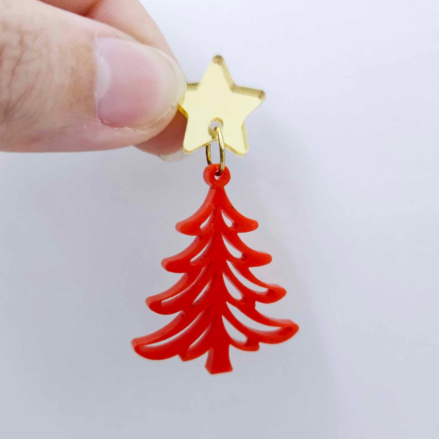 One 35mm solid red Cascade Christmas Tree dangle blank assembled with a 16mm star topper, shown as a finished earring component