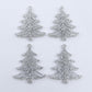 Two pairs of 35mm silver glitter acrylic Cascade Christmas Tree dangle earring blanks laying flat on a white background