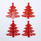 Two pairs of 35mm solid red Cascade Christmas Tree dangle blanks laying flat on a white background
