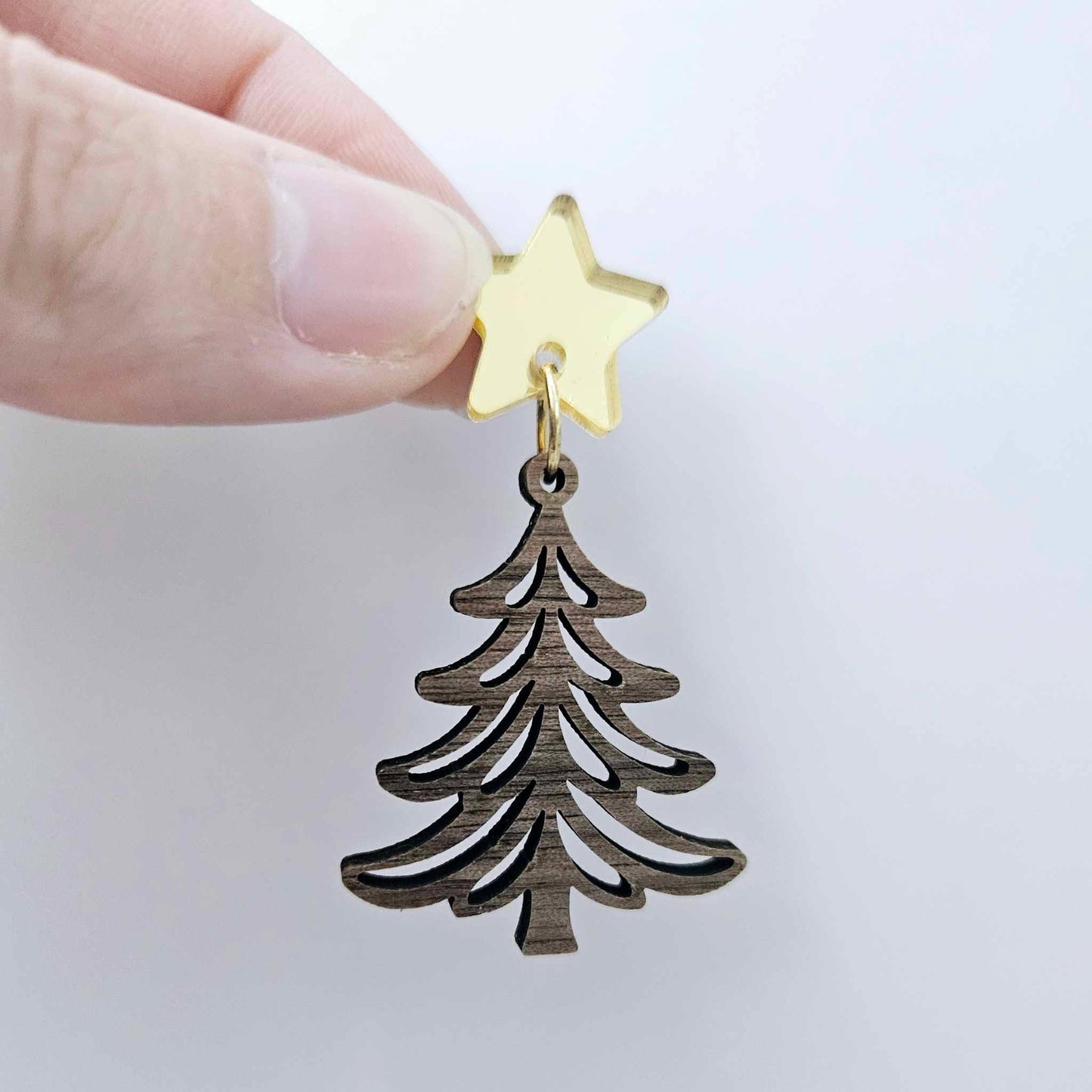 One 35mm walnut veneer Cascade Christmas Tree dangle earring blank assembled with a 16mm star topper, shown as a finished earring component