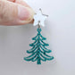 One 35mm teal glitter acrylic Cascade Christmas Tree dangle earring blank assembled with a 16mm star topper, shown as a finished earring component