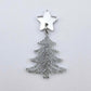 One 35mm silver glitter acrylic  Cascade Christmas Tree dangle earring blank assembled with a 16mm star topper, shown as a finished earring component