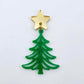 One 35mm solid green Cascade Christmas Tree dangle blank assembled with a 16mm star topper, shown as a finished earring component