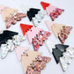 A mixture of the three non-traditional 40mm three piece Christmas Tree dangle earring blank designs laying flat on a white background