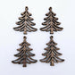 Two pairs of 35mm walnut veneer Cascade Christmas Tree dangle earring blanks laying flat on a white background