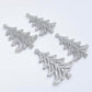 Two pairs of 35mm silver glitter acrylic Cascade Christmas Tree dangle earring blanks laying flat on a white background