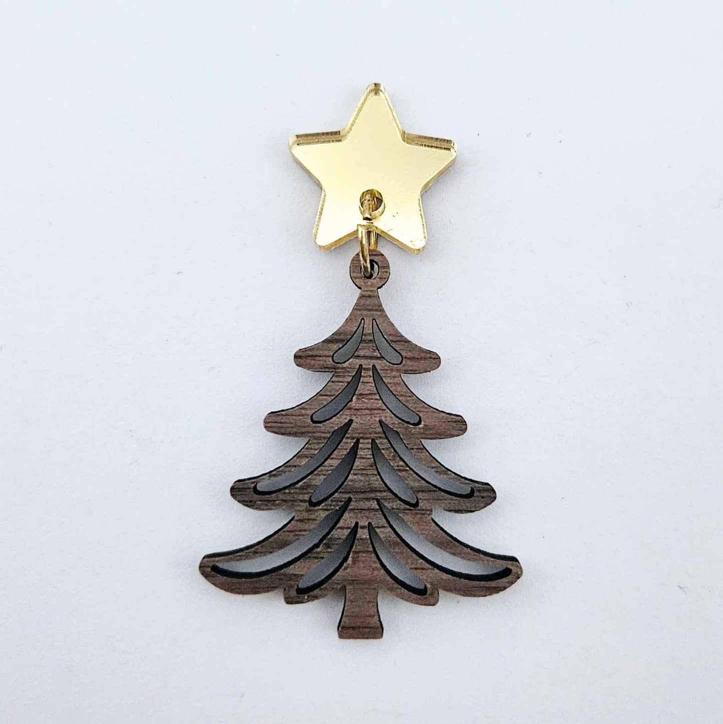 One 35mm walnut veneer Cascade Christmas Tree dangle earring blank assembled with a 16mm star topper, shown as a finished earring component
