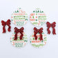 Two pairs of Christmas Text UV printed bauble dangle blanks with included red glitter bows laying flat
