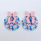 One pair of Snowman Wonderland UV printed bauble dangle blanks with included pastel pink bows laying flat