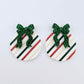 One pair of Stripey Christmas UV printed bauble dangle blanks with included green glitter bows laying flat