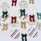 A selection of the three Traditional Christmas UV printed bauble dangle blank designs with their coordinating glitter bows laying flat