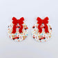 One pair of Vintage Truck UV printed bauble dangle blanks with included solid red bows laying flat