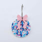 One Snowman Wonderland UV printed bauble and included pastel pink bow assembled on a 20mm hoop