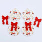 Two pairs of Vintage Truck UV printed bauble dangle blanks with included solid red bows laying flat