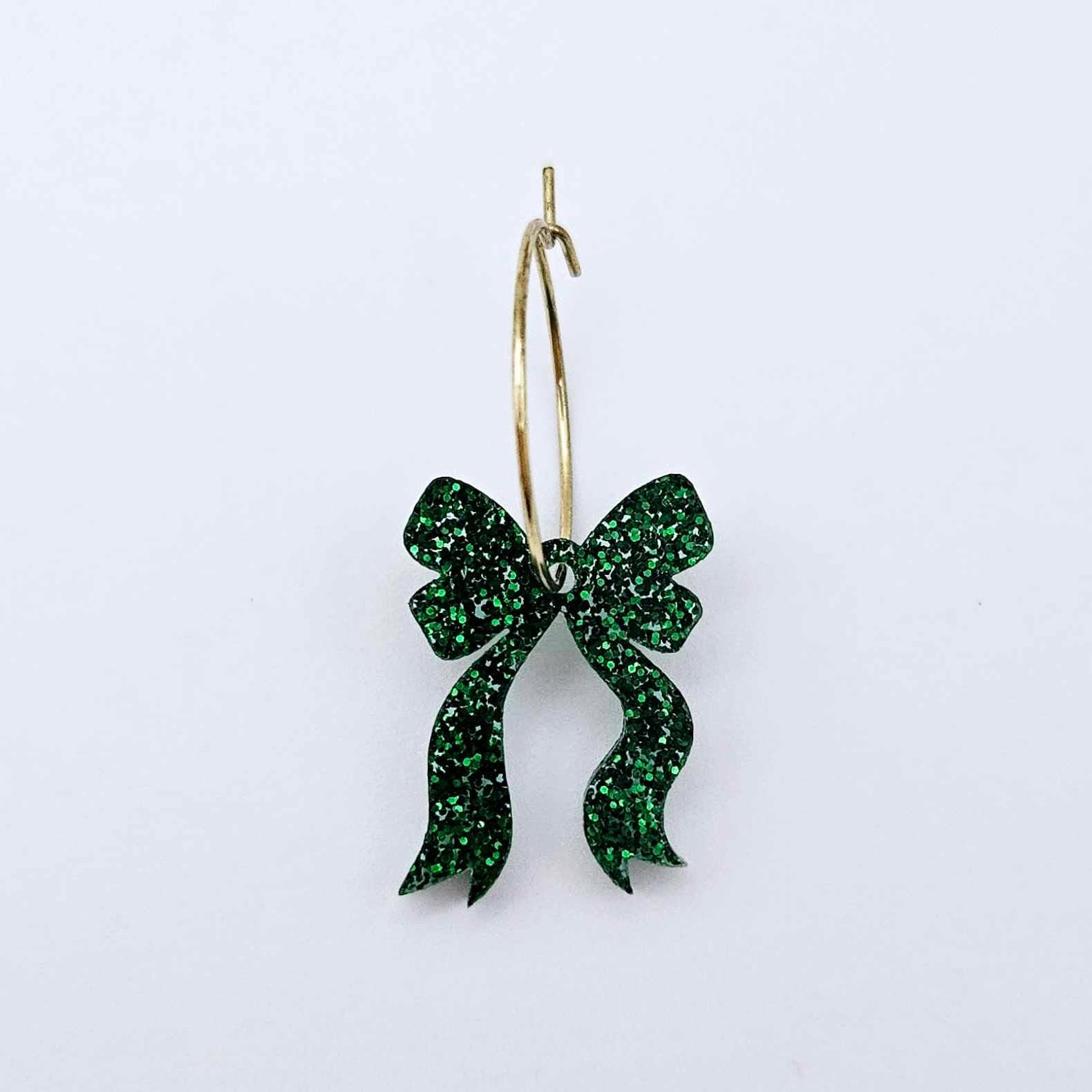 One green glitter acrylic bow dangle earring blank assembled on a 20mm hoop