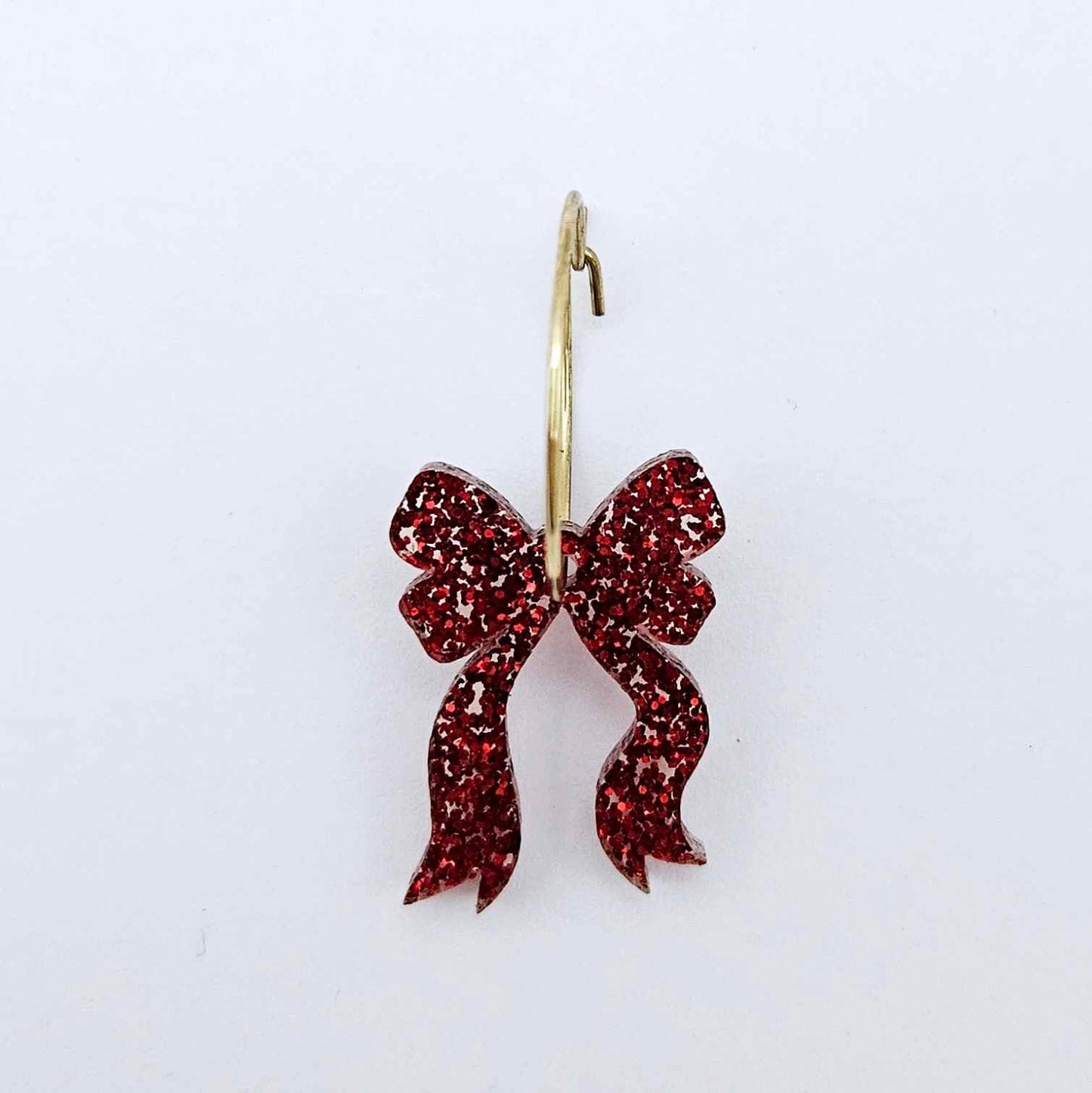 One red glitter acrylic bow dangle earring blank assembled on a 20mm hoop