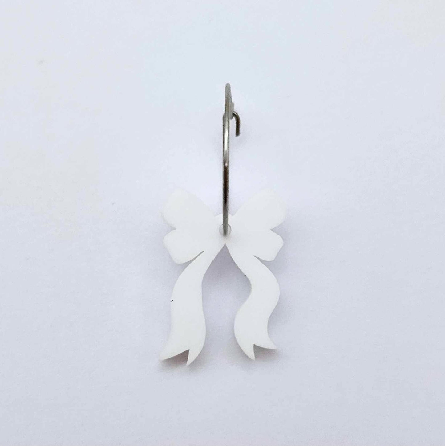 One white acrylic bow dangle earring blank assembled on a 20mm hoop