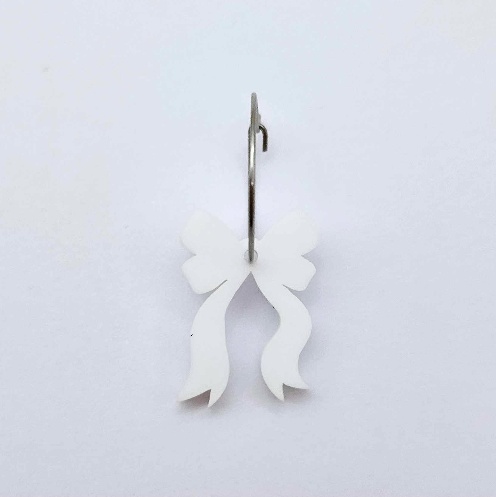One white acrylic bow dangle earring blank assembled on a 20mm hoop