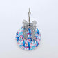 One silver glitter acrylic bow shown paired with a UV printed bauble on a 20mm hoop