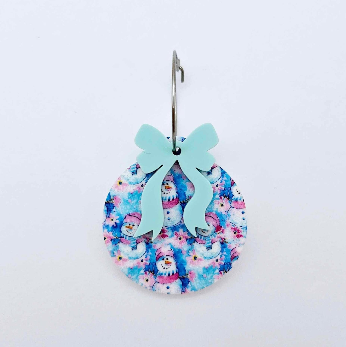 One Snowman Wonderland UV printed bauble and included pastel aqua bow assembled on a 20mm hoop