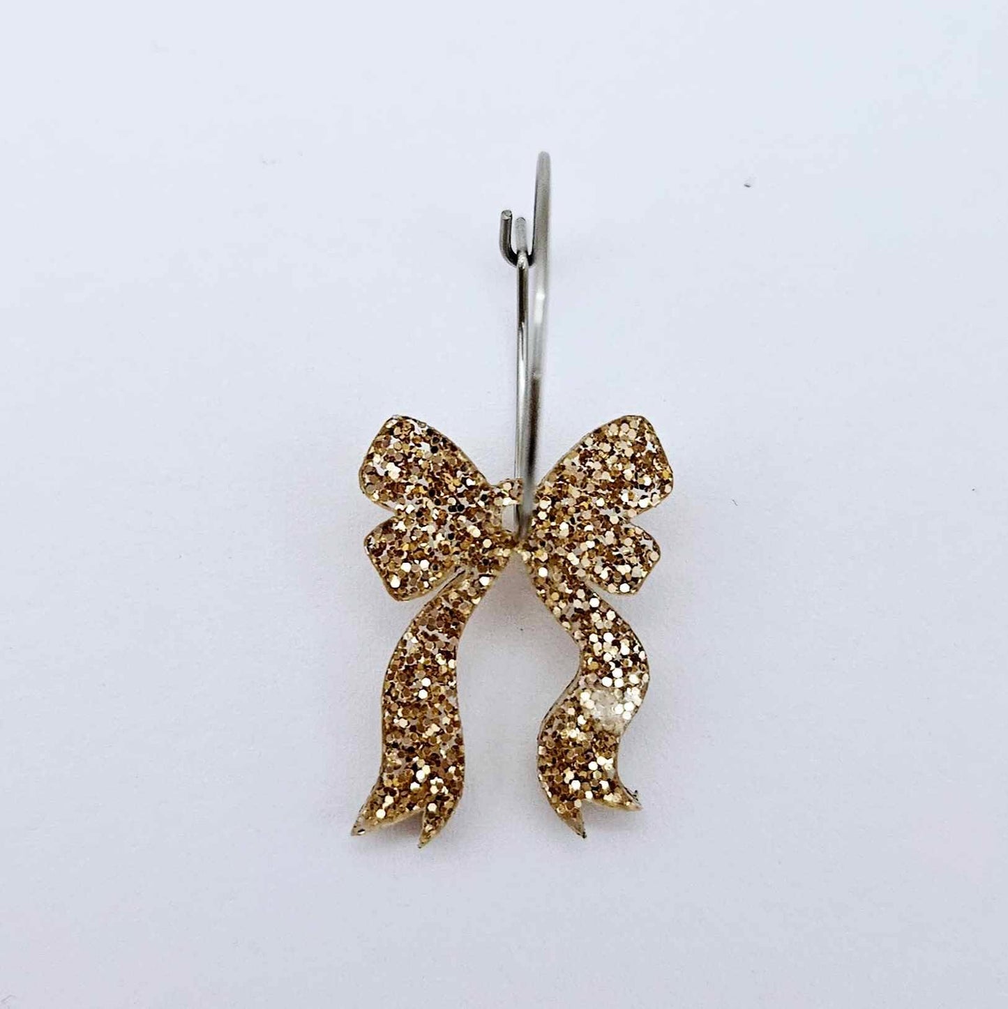One rose gold glitter bow dangle blank assembled on a 20mm hoop