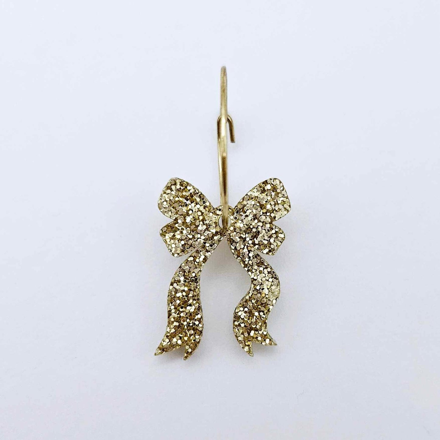 One gold glitter acrylic bow dangle earring blank assembled on a 20mm hoop
