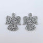 One pair of 32mm silver glitter acrylic angel dangle earring blanks laying flat on a white background