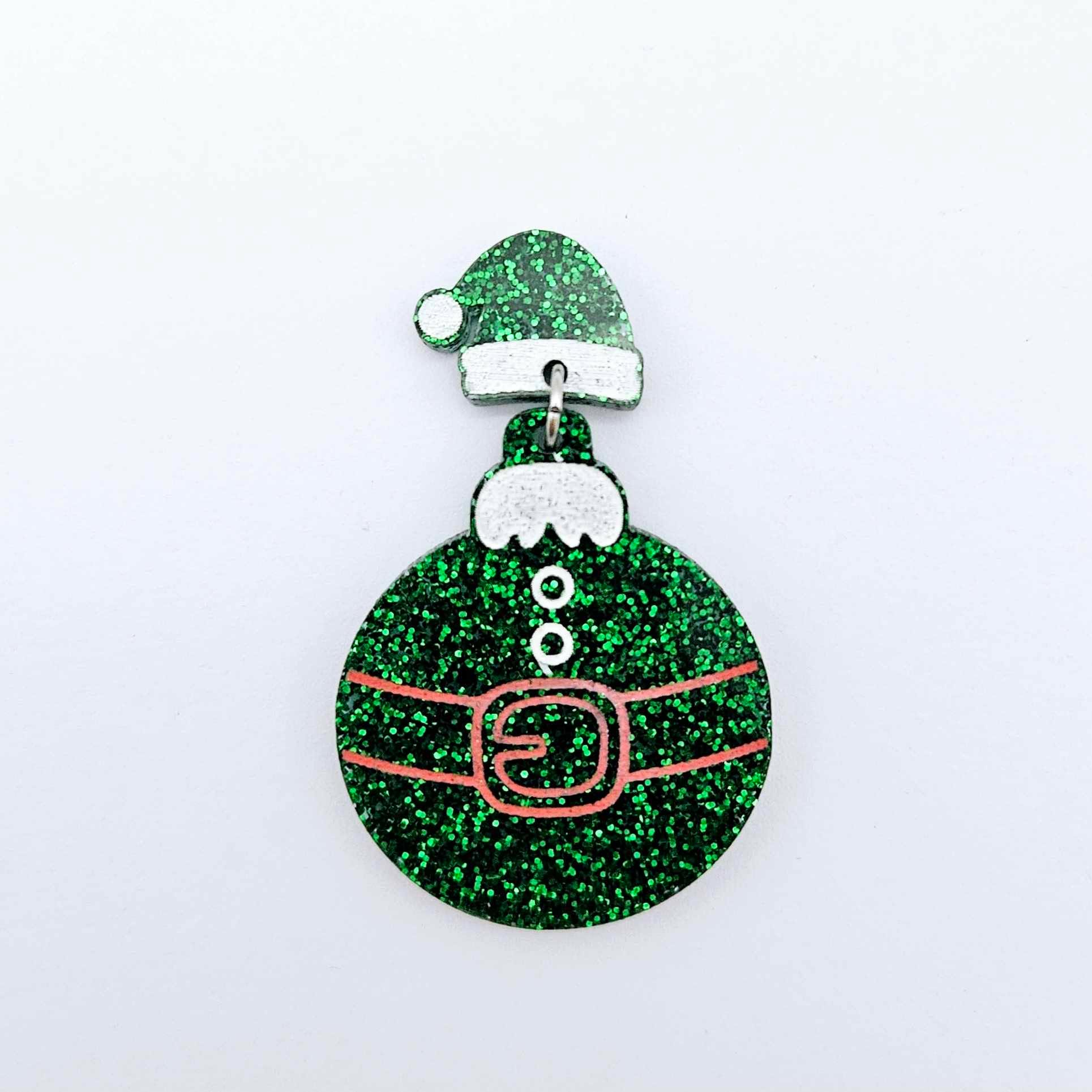 One green glitter Santa hat topper attached to a Christmas Santa Bauble dangle, shown as a finished festive earring design