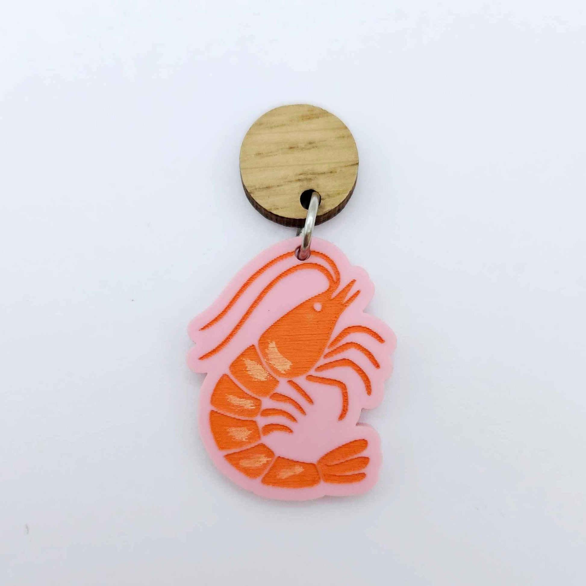 One pastel pink acrylic prawn dangle earring blank assembled with a 14mm Oak Wood Topper, shown as a festive Australian Christmas earring