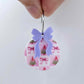 One Pink Patchwork UV printed bauble and included pastel purple bow assembled on a 20mm hoop