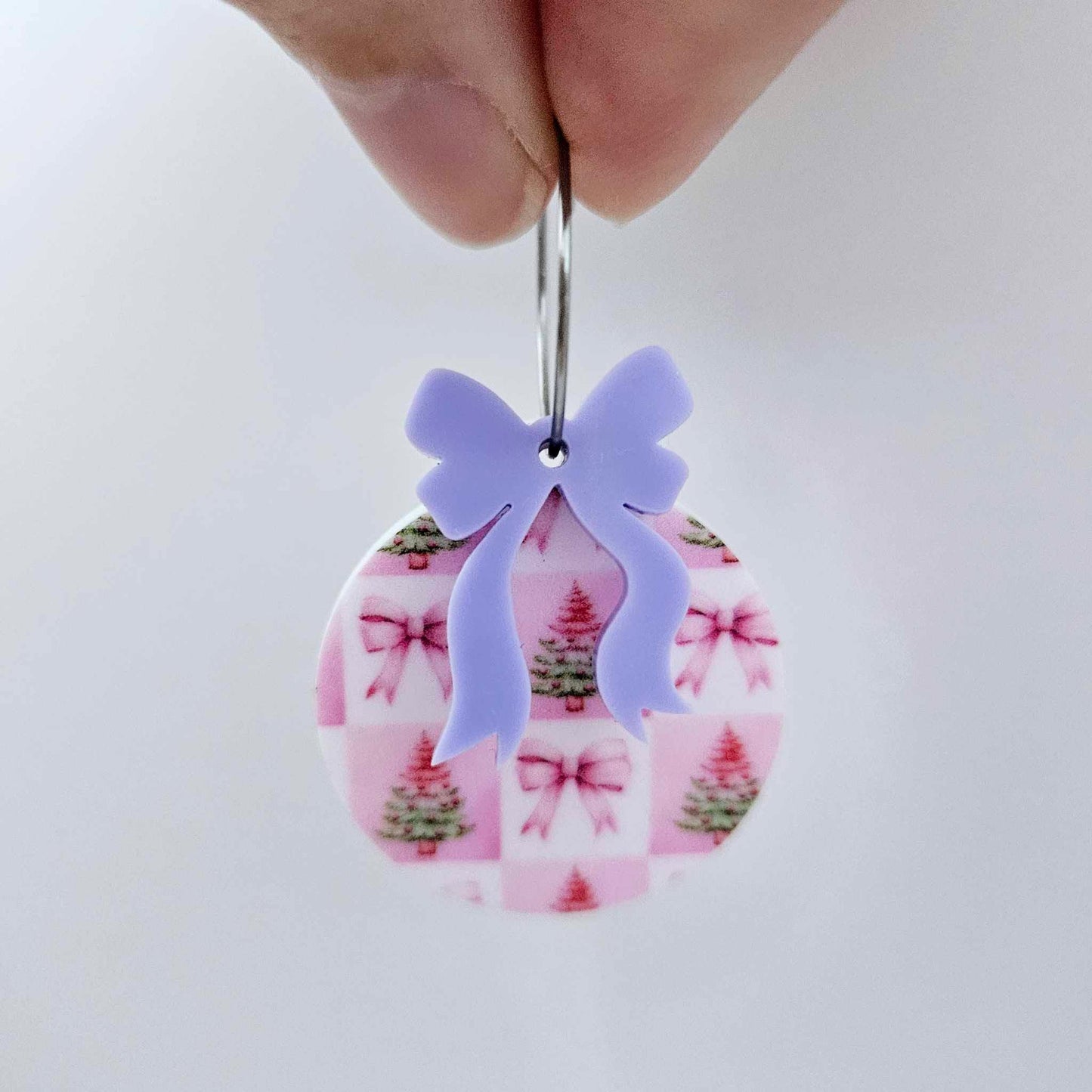One Pink Patchwork UV printed bauble and included pastel purple bow assembled on a 20mm hoop