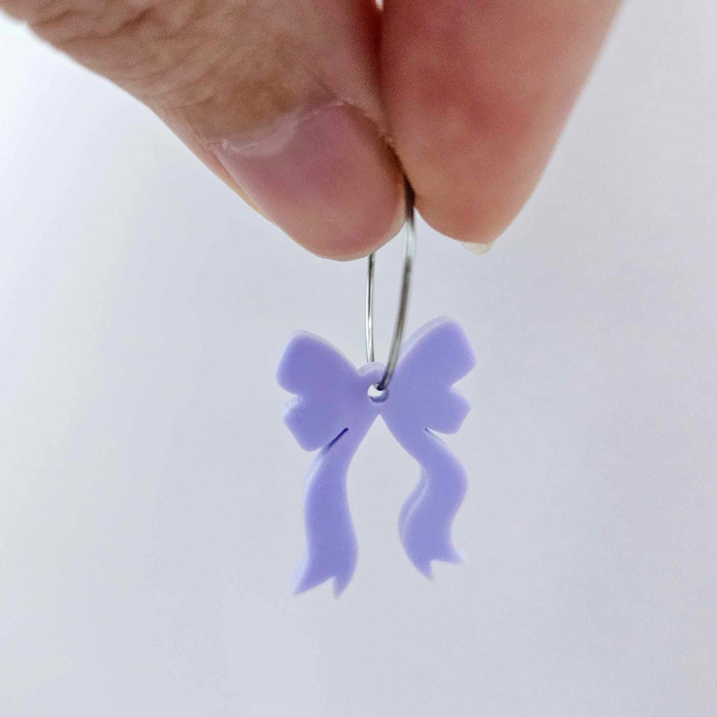 One pastel purple acrylic bow dangle earring blank assembled on a 20mm hoop
