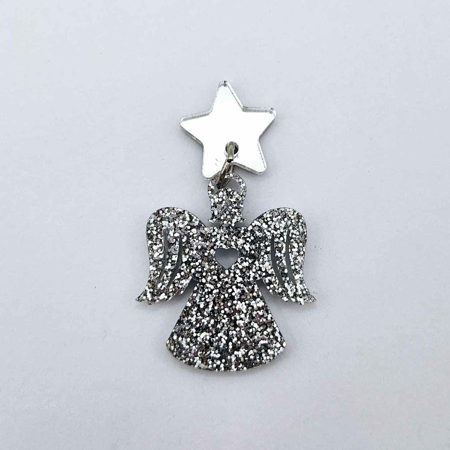 One 32mm silver glitter acrylic angel dangle earring blank assembled with a 16mm silver mirror star topper, shown as a finished earring