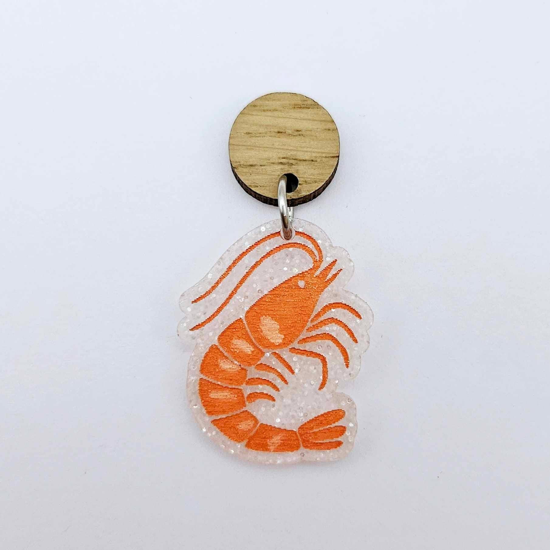 One fairy dust glitter acrylic prawn dangle earring blank assembled with a 14mm Oak Wood Topper, shown as a festive Australian Christmas earring