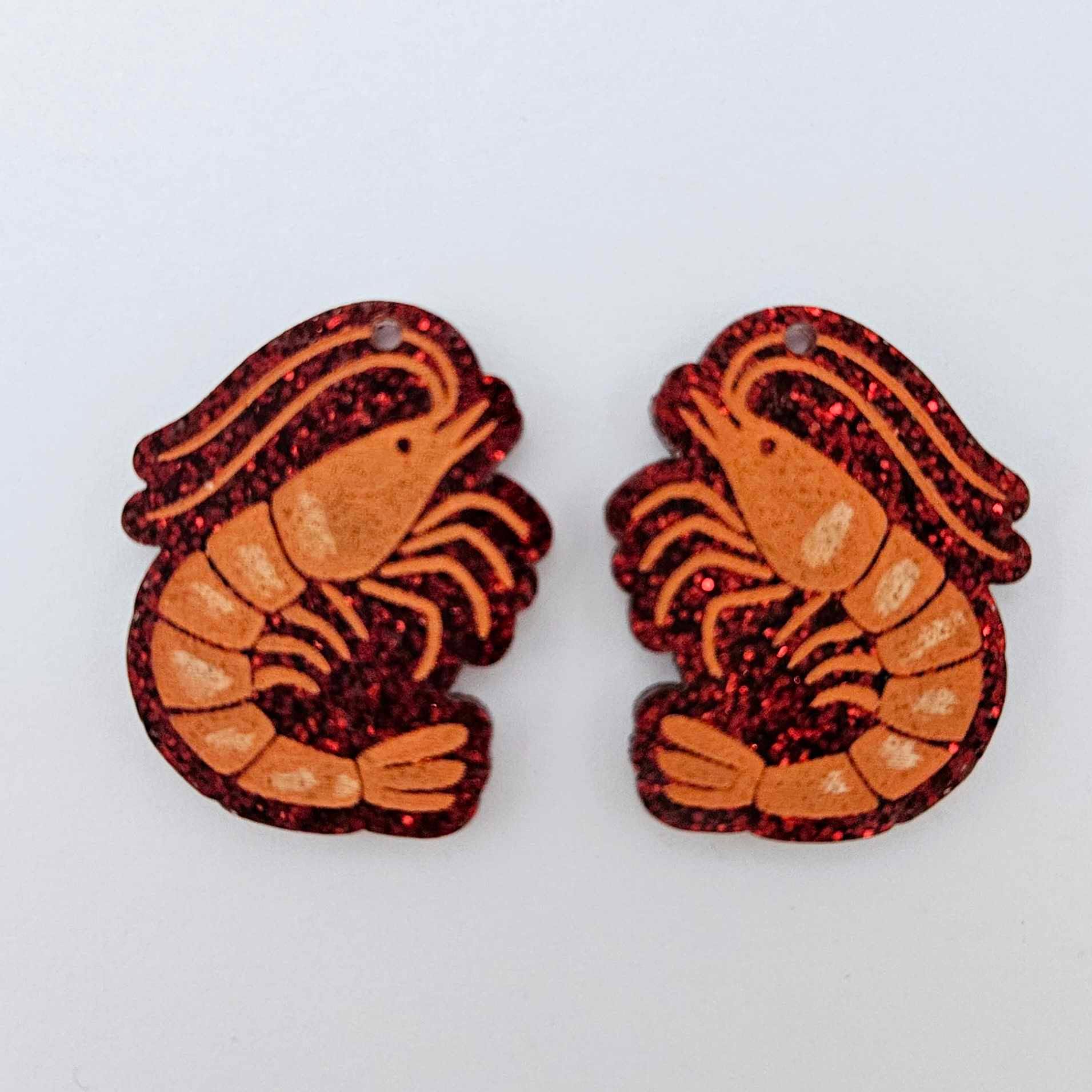 One pair of red glitter acrylic prawn dangle erring blanks paint filled with orange and white details