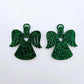 One pair of 32mm green glitter acrylic angel dangle earring blanks laying flat on a white background