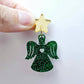 One 32mm green glitter acrylic angel dangle earring blank assembled with a 16mm gold mirror star topper, shown as a finished earring