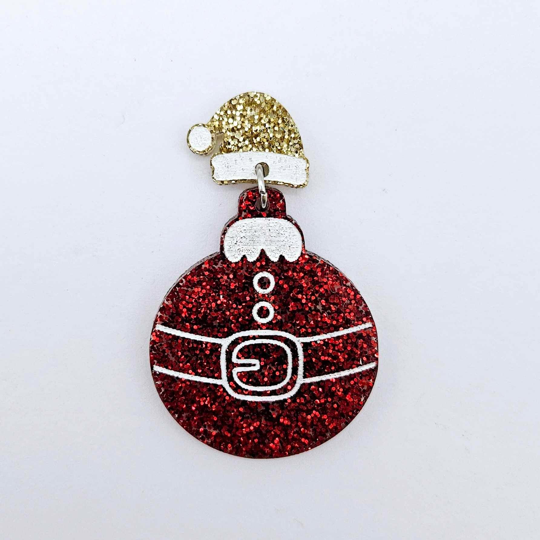 One gold glitter acrylic Santa hat topper attached to a Christmas Santa Bauble dangle, shown as a finished festive earring design