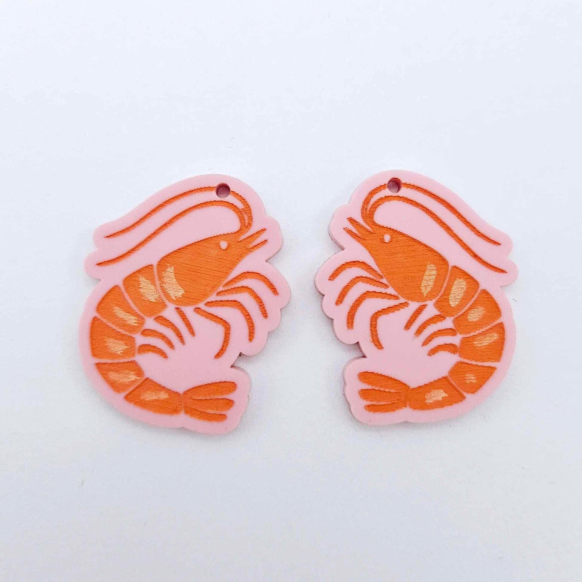 One pair of pastel pink acrylic prawn dangle erring blanks paint filled with orange and white details