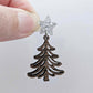 One 14mm silver glitter star topper paired with a walnut Christmas tree dangle to show how it can be used in a festive earring design