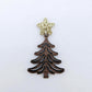 One 14mm gold glitter star topper paired with a walnut Christmas tree dangle to show how it can be used in a festive earring design