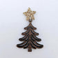 One 14mm rose gold glitter star topper paired with a walnut Christmas tree dangle to show how it can be used in a festive earring design