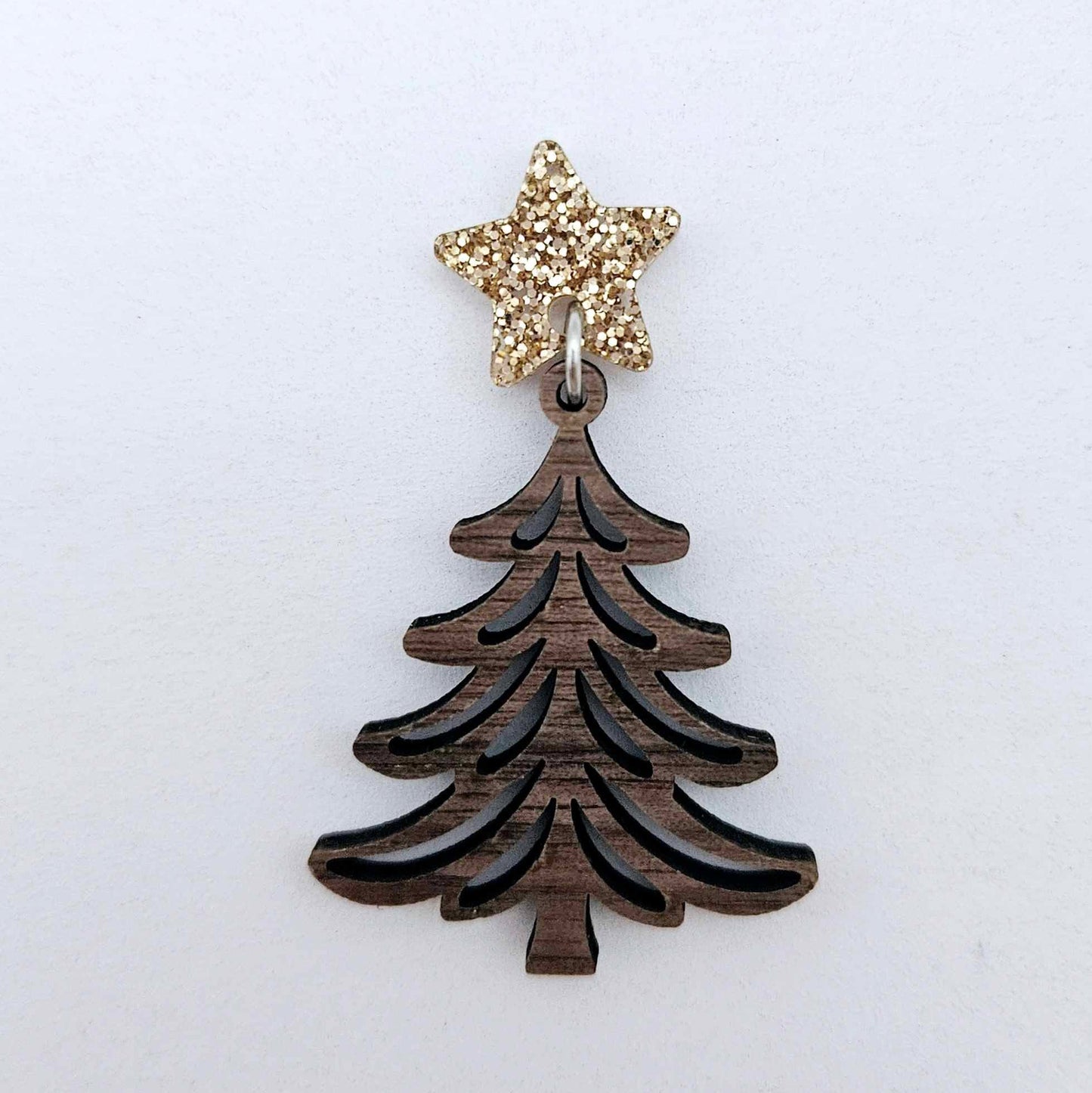 One 14mm rose gold glitter star topper paired with a walnut Christmas tree dangle to show how it can be used in a festive earring design