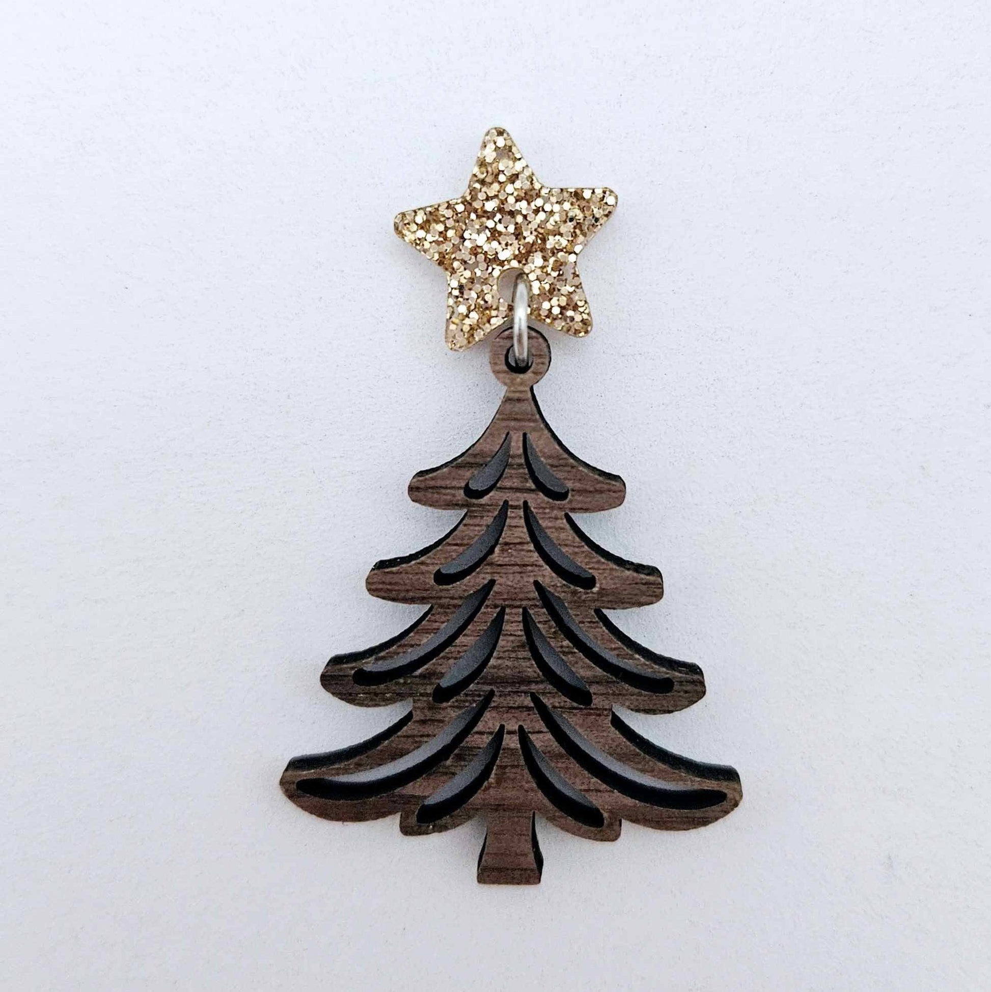 One 14mm rose gold glitter star topper paired with a walnut Christmas tree dangle to show how it can be used in a festive earring design