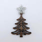 One 14mm silver glitter star topper paired with a walnut Christmas tree dangle to show how it can be used in a festive earring design