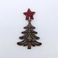 One 14mm red glitter star topper paired with a walnut Christmas tree dangle to show how it can be used in a festive earring design